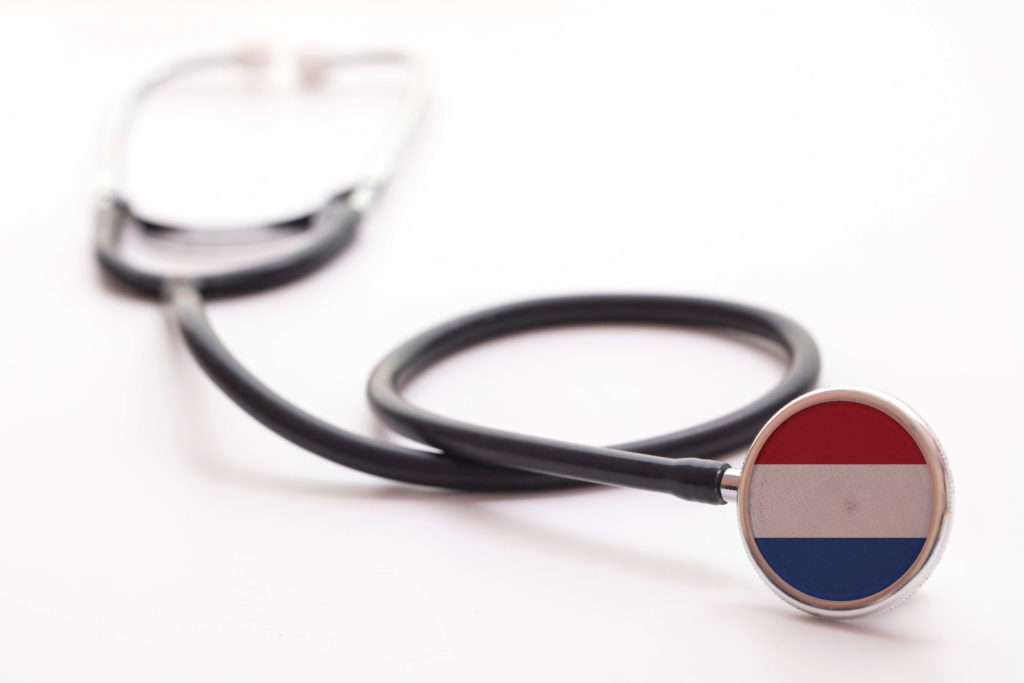 Netherlands healthcare concept. Medical stethoscope with country flag