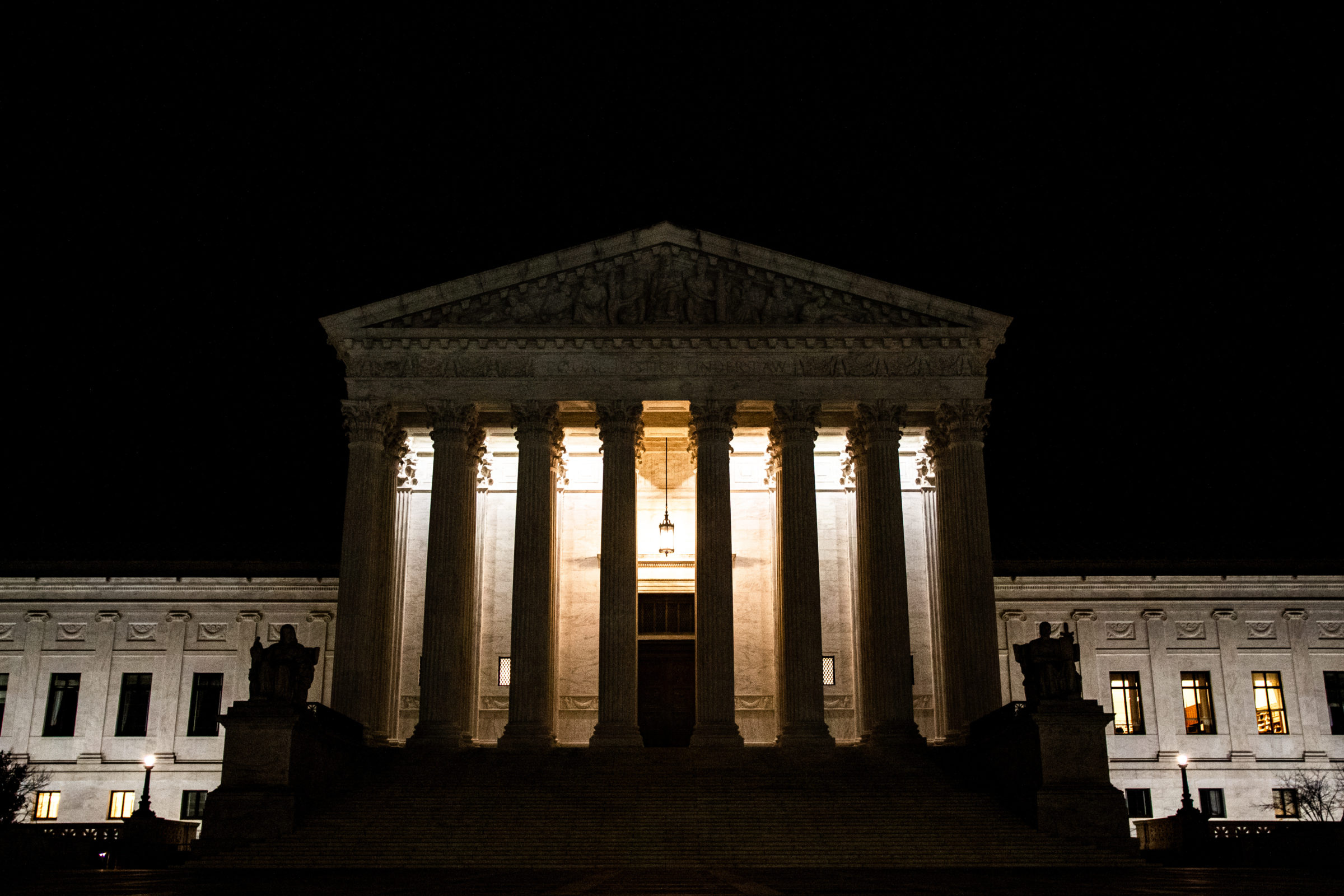 Night view of the Supreme Court Building in Washington, United States