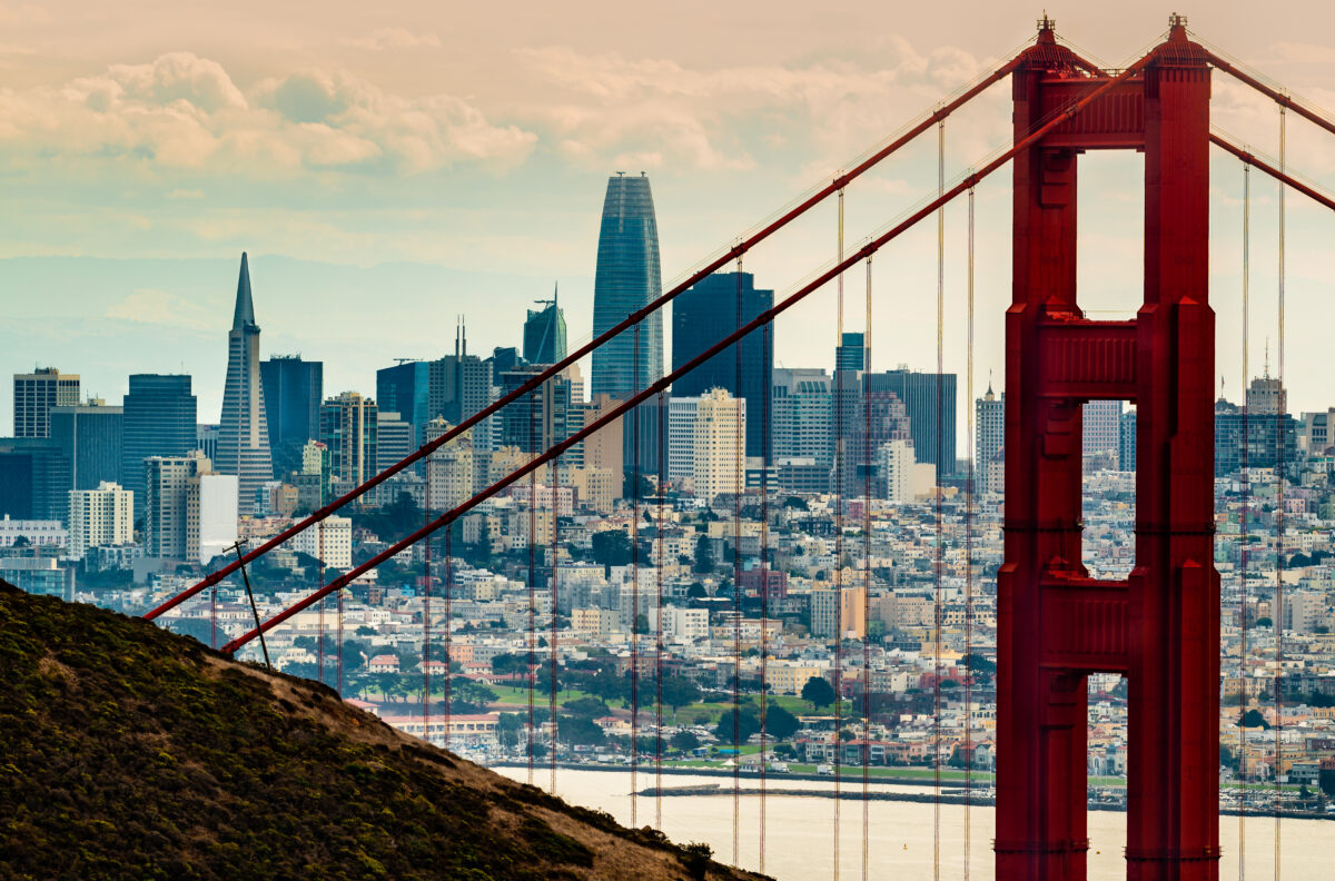 City of San Francisco Ca. Downtown business district seen through the north tower of the Golden Gate Bridge
