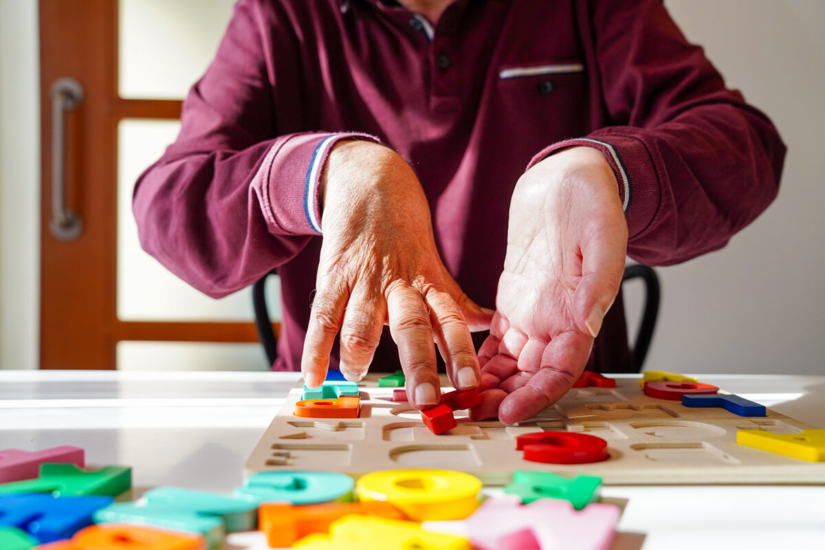 ALS person working on memory and coordination skills